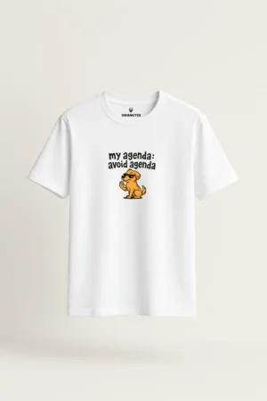 White t-shirt featuring a cartoon dog in sunglasses with the quote “My Agenda: Avoid Agenda” – funny unisex tee by Swankyss front view