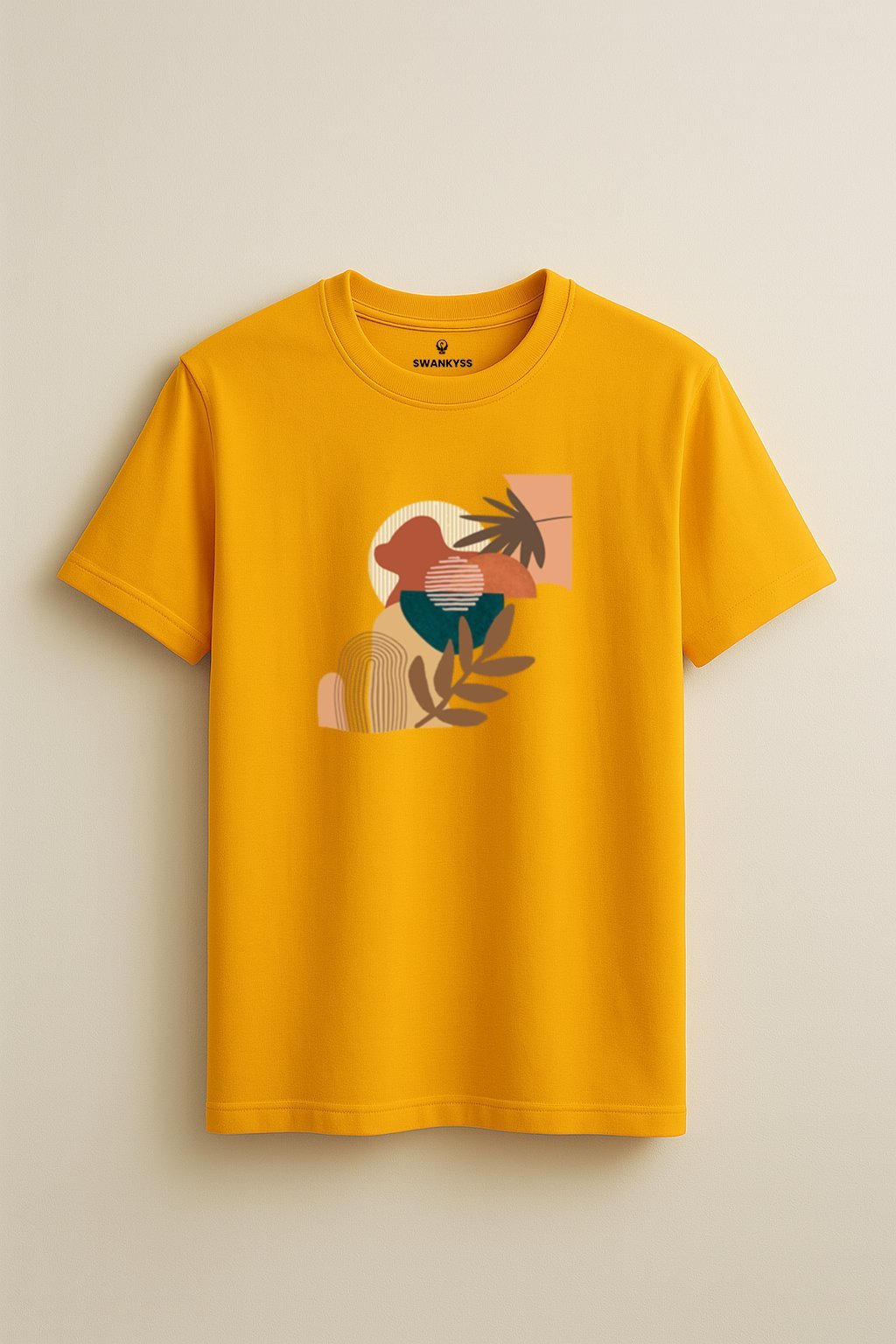 compressed_boho_art_tshirt Mustard yellow t-shirt with abstract earth-tone art print featuring geometric shapes and natural elements, unisex fit front view