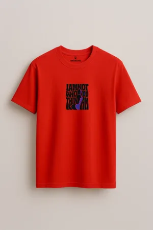 Bright red unisex t-shirt featuring a black and purple silhouette with retro typography that reads “I Am Not Who You Think I Am” – artistic Swankyss statement tee front view