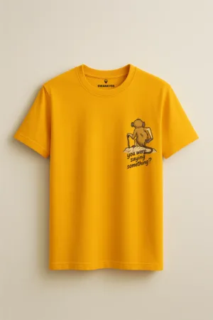 Mustard yellow t-shirt with cartoon monkey and quote “You were saying something?” – unisex sarcastic graphic tee by Swankyss front view