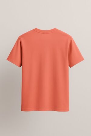 Bright peach t-shirt with an upside-down cartoon monkey sipping coconut water and playful “Stay Weird” text – Swankyss unisex funny animal tee back view