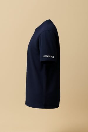 Navy blue unisex t-shirt with cartoon cat and dog graphic and bold “Chaos Coordinator – Professional Level” text, fun pet-themed design by Swankyss left side view