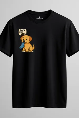 Black unisex t-shirt with a cute cartoon yellow dog holding a blue sock and the quote “Sock Over Life” – humorous pet-themed design by Swankyss front view
