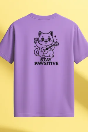Lavender t-shirt with black line art of a smiling cartoon cat playing a ukulele with the message “Stay Pawsitive” – positive and cute animal tee by Swankyss back view