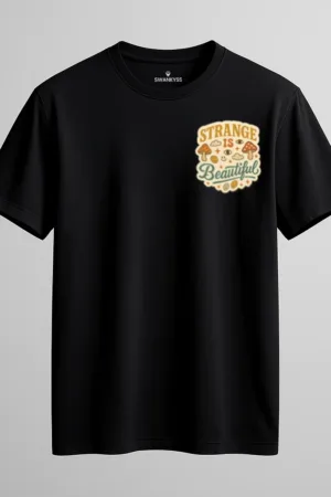 Black unisex t-shirt with retro psychedelic design and the quote “Strange Is Beautiful” surrounded by mushrooms, clouds, and stars – vintage aesthetic tee by Swankyss front view