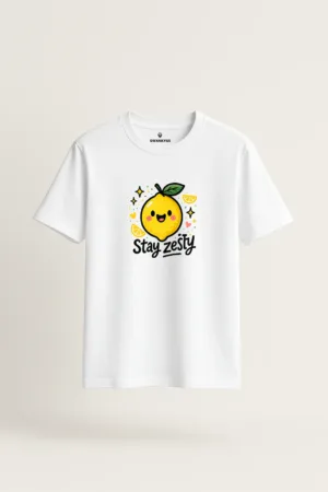 White unisex t-shirt featuring a cute cartoon lemon with sparkles, lemon slices, and the text “Stay Zesty” in playful typography front view