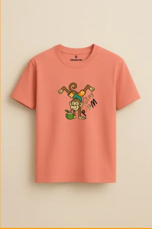 Bright peach t-shirt with an upside-down cartoon monkey sipping coconut water and playful “Stay Weird” text – Swankyss unisex funny animal tee front view